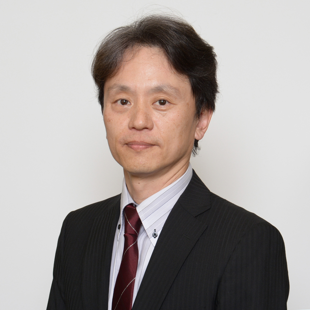 小稲 克也